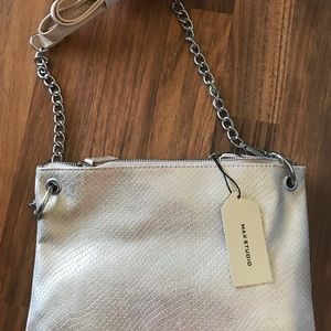 New max studio cross body purse color is blush